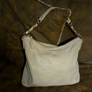 Kate Spade Pebble Handbag with Chain Detailed Strap and Spacious Interior